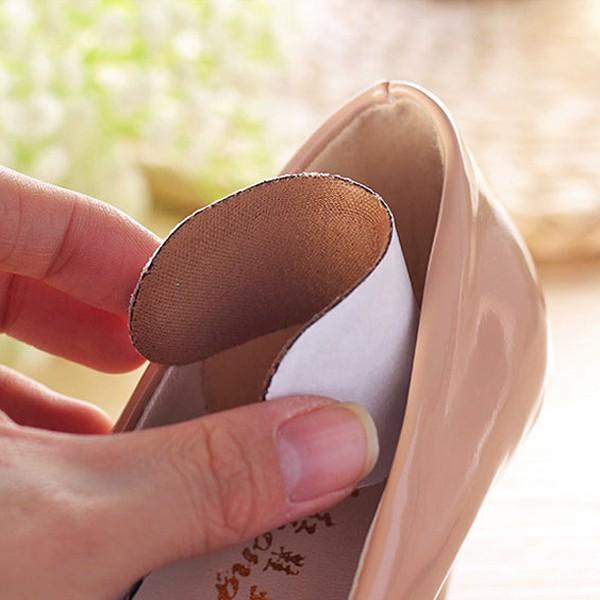 MIẾNG DÁN GÓT GIÀY CHỐNG RỘNG CHÂN BẰNG VẢI