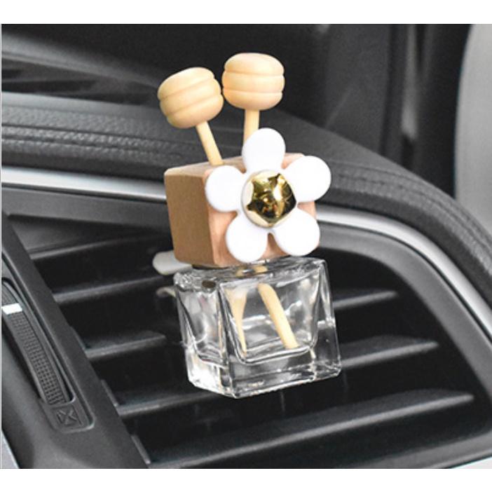 Lọ đựng khuếch tán tinh dầu ô tô cài cửa gió gắn hoa cúc xinh xắn - Hoàng Đông Shop.