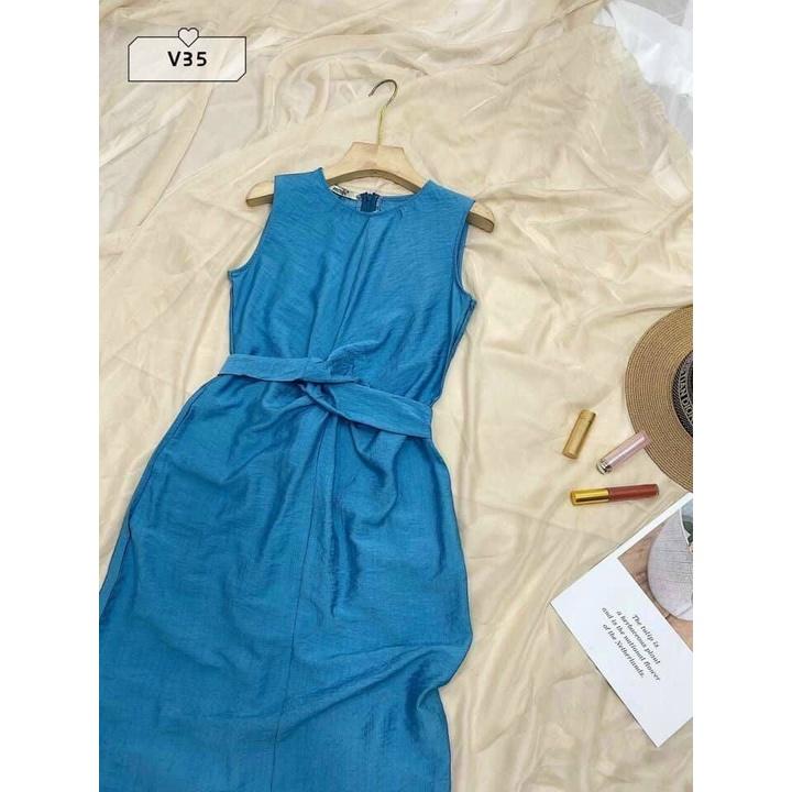 Đầm suông đũi xoắn eo xẻ tà y hình