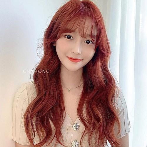Nhuộm tóc màu đỏ cam ánh hồng kèm oxi và gang tay