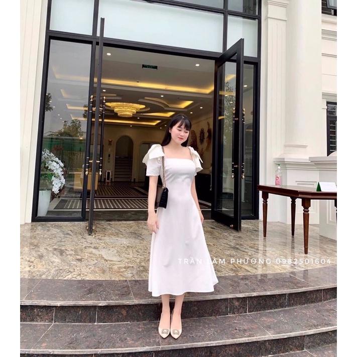 Đầm xoè trắng cổ vuông vai nơ
