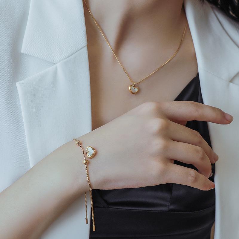 Set bộ trang sức nữ bông tai dây chuyền lắc tay nữ titan trái tim quà tặng Ring House