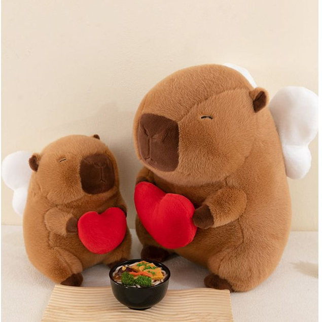 Thú nhồi bông Capybara cánh thiên thần đáng yêu - Size 30cm đến 50cm - Quà tặng gấu bông chuột lang ôm tim cánh trắng êm mịn.