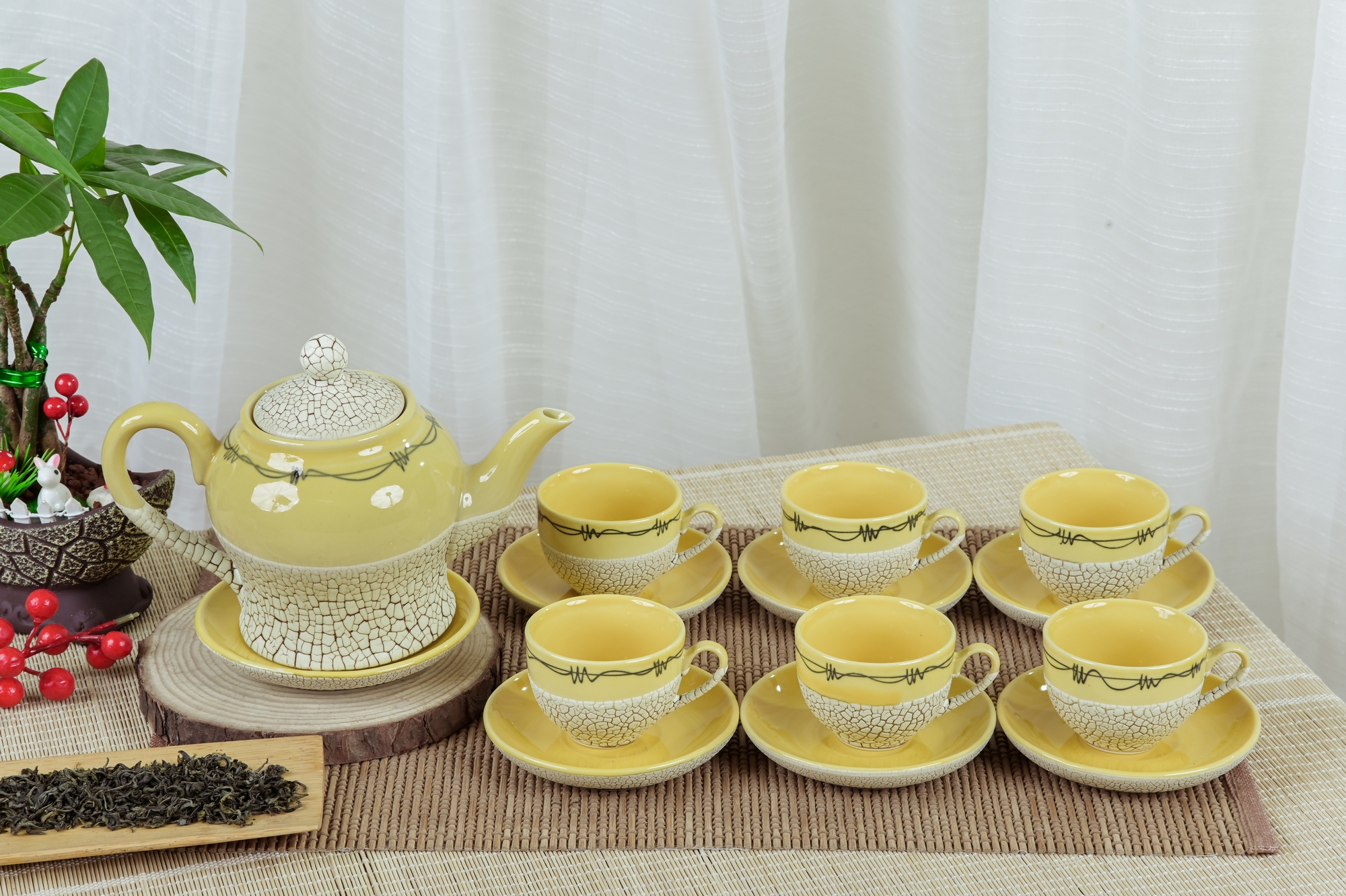 Bộ ấm chén men lưới màu vàng