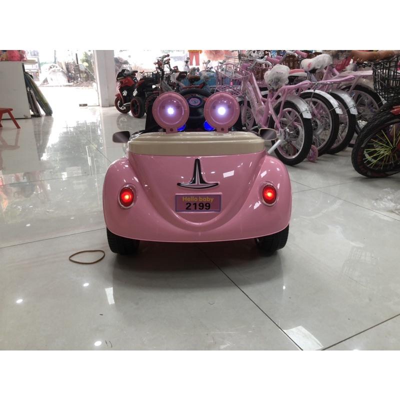 Ô TÔ điện trẻ em helo kity mèo cho các bé gái có điều khiển từ xa nhạc đèn cho bé