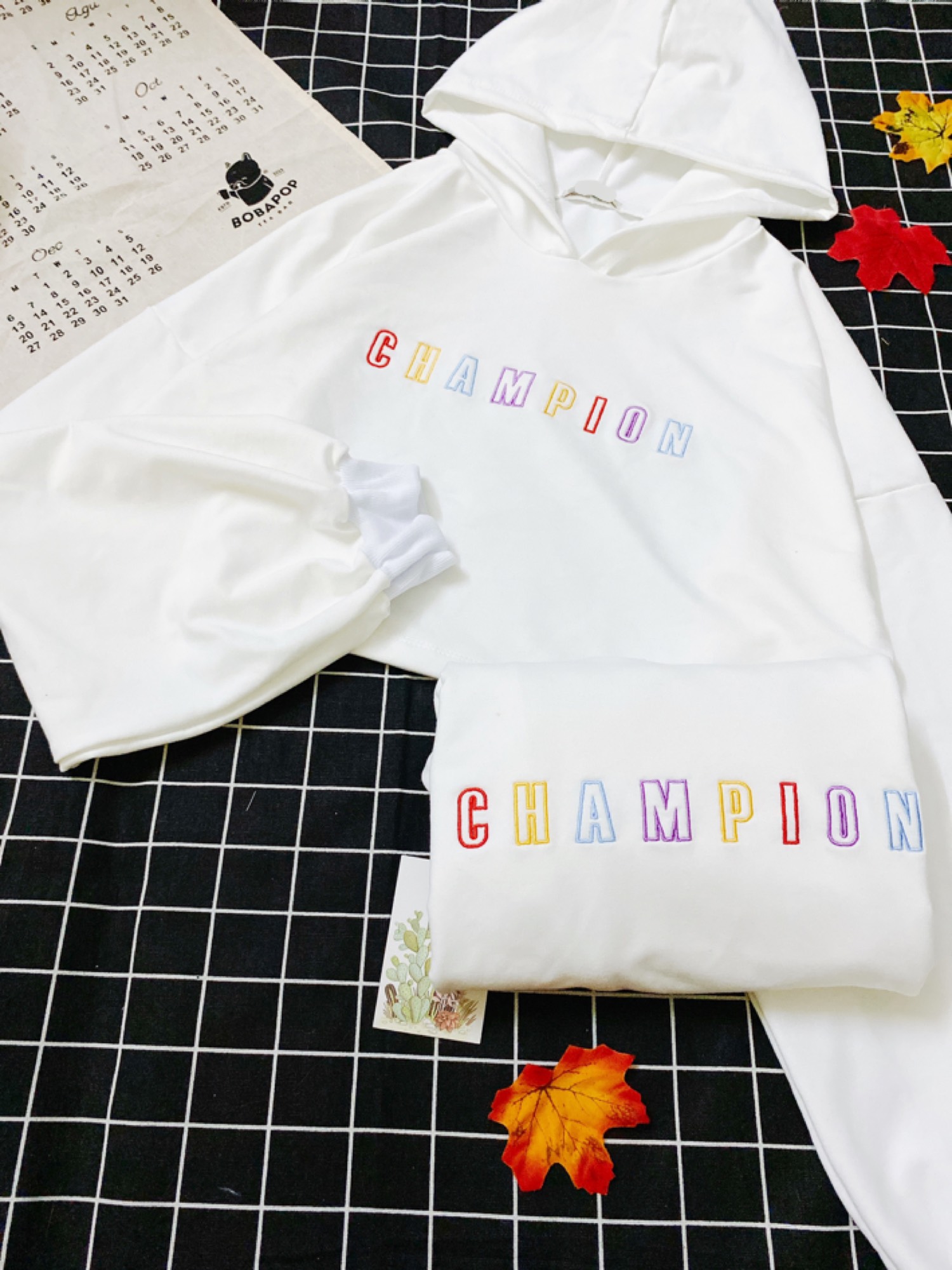 Áo croptop tay dài có nón form rộng (Nhiều Mẫu) - Chữ CHAMPION THÊU (Trắng)
