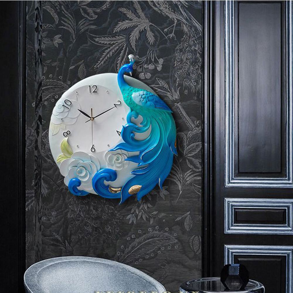 Đồng Hồ Treo tường Công Xanh Hoàng Gia DHG-BLU50CM , làm từ hỗn hợp bột gốm phù điêu cao cấp, sang trọng, máy siêu tĩnh thích hợp cho mọi không gian phòng của bạn kể cả phong cách hiện đại hay tân cổ điển.