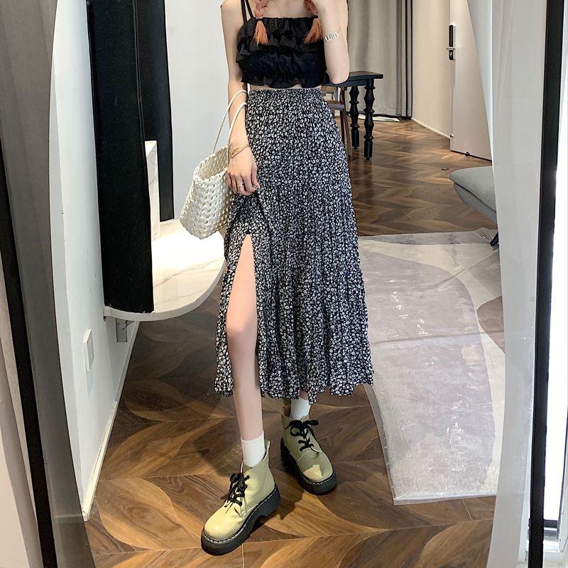 DONGSHOP Cao cấp hoa xẻ tà nửa người váy mùa xuân và mùa hè 2023 Vintage thả cảm thấy gầy váy xếp li một chữ dài váy