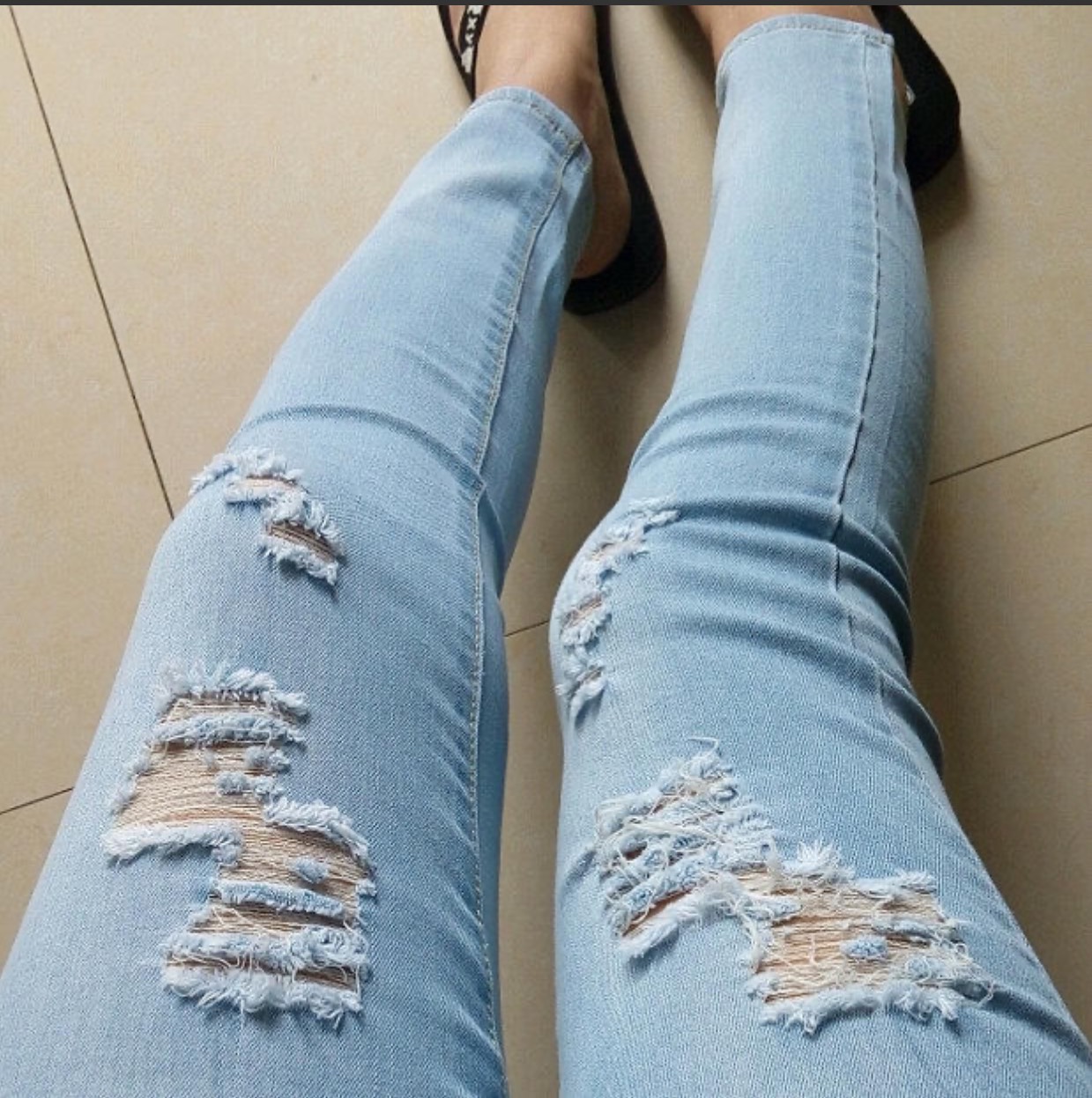 Quần jeans bầu rách cá tính