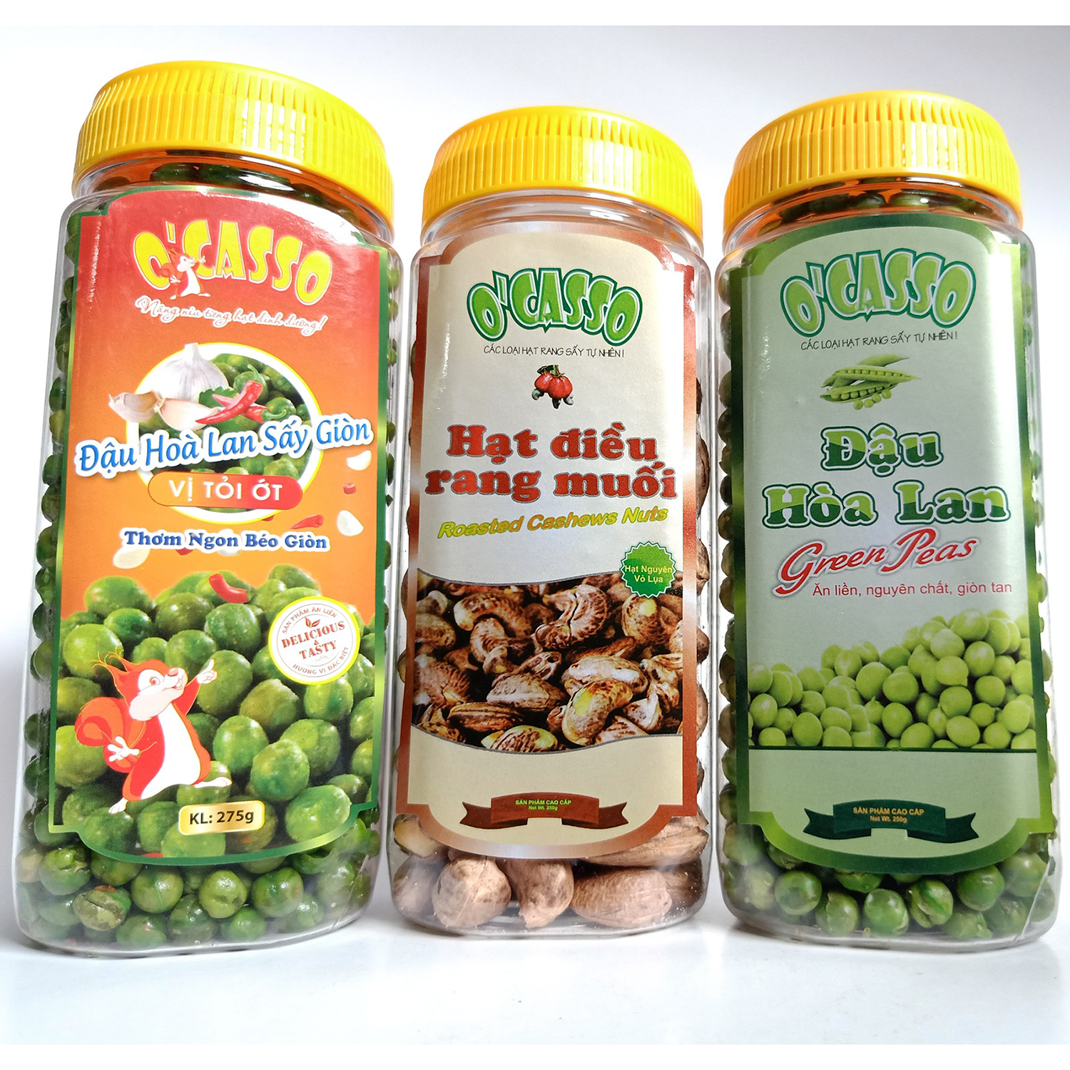 Combo 3 Hộp Hạt Điều Rang Muối Vỏ Lụa 250g + Đậu Hòa Lan Sấy Giòn Vị Tỏi Ớt 275g + Đậu Hòa Lan Sấy Giòn Vị Muối O'Casso 275g