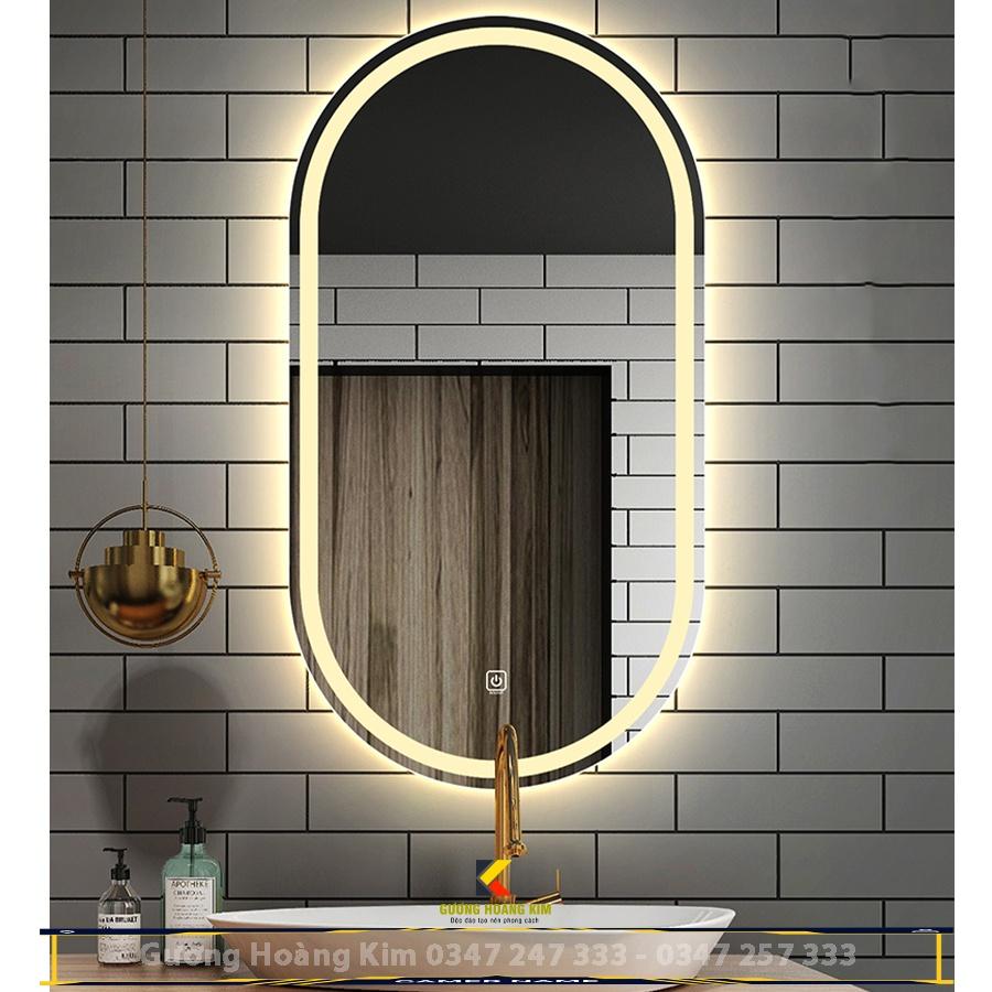 gương cảm ứng đèn led treo tường oval elip bầu dục nhà tắm phòng wc trang điểm makeup decor phôi gương bỉ AGC cao cấp kích thước 50x90cm và 60x100cm guonghoangkim mã HK-2006