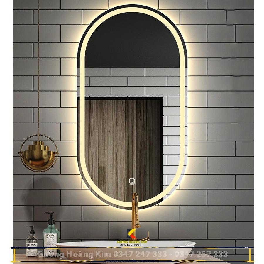 Gương cảm ứng đèn led treo tường oval elip bầu dục nhà tắm phòng wc trang điểm makeup decor phôi gương bỉ AGC cao cấp kích thước 50x90cm và 60x100cm guonghoangkim mã HK-2006