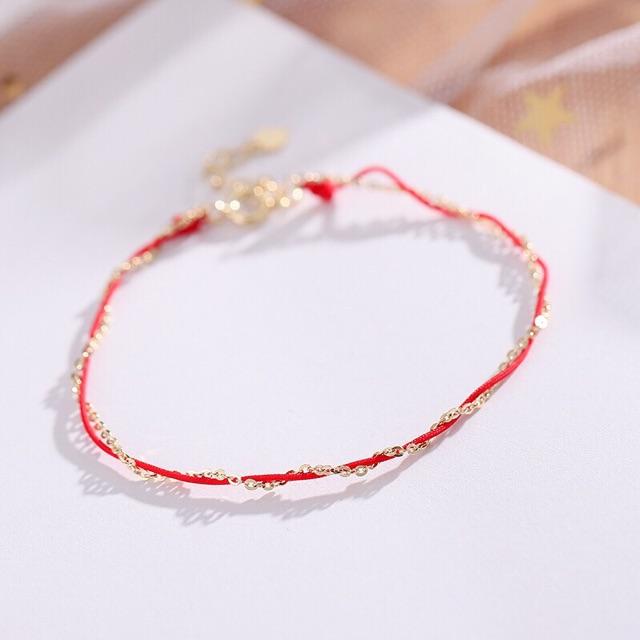 Vòng tay titan dây đỏ xoắn trơn