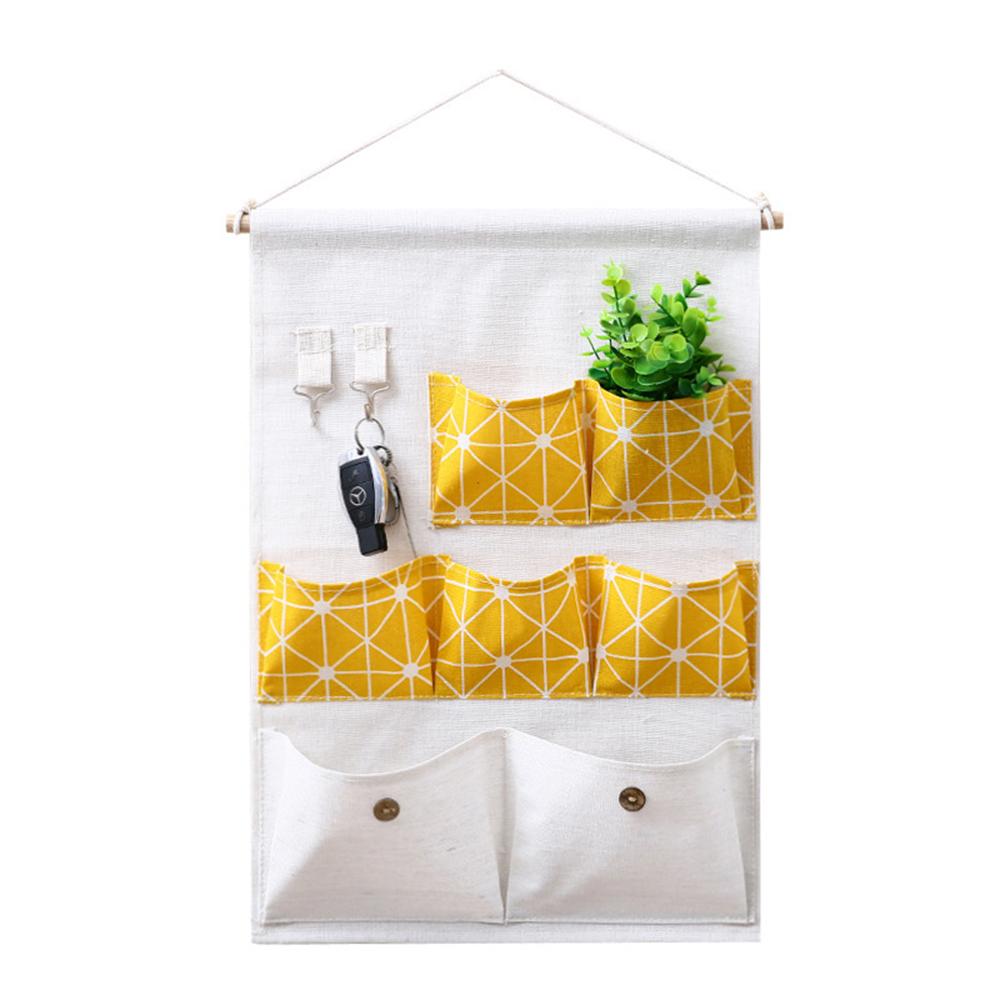 Túi vải treo tường bằng cottonlinen cao cấp với 7 ngăn đựngvà 2 móc đồ tiện dụng