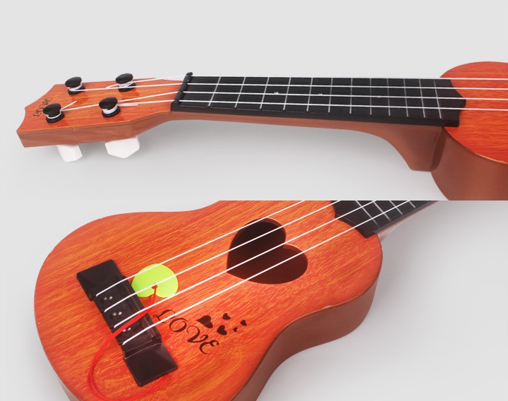 Đàn guitar mini dành cho bé - Đàn 4 dây ( Giao màu ngẫu nhiên )