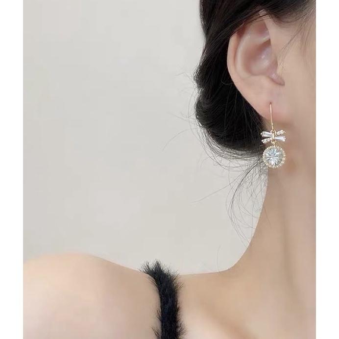Bông tai khuyên tai nữ nơ thả tròn ngọc trắng sáng Ring House