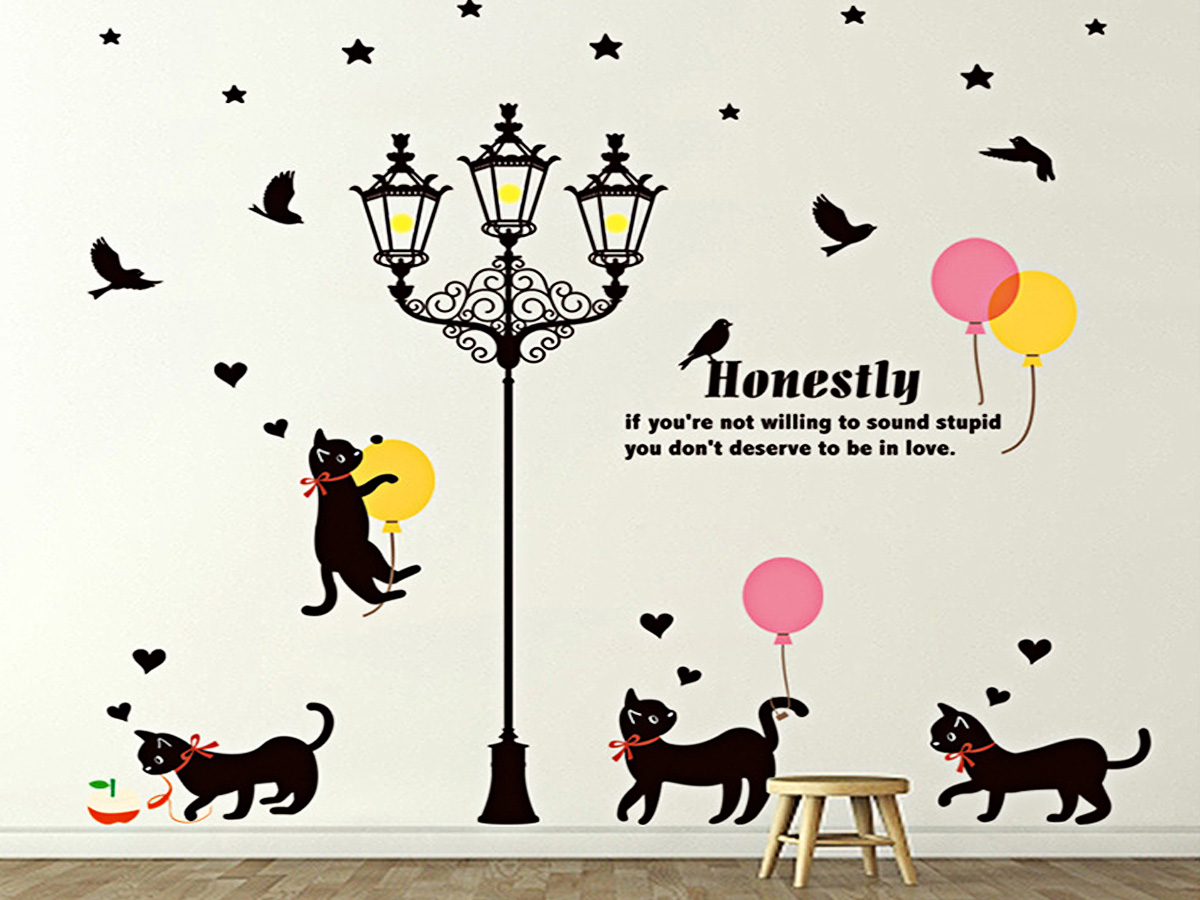 Decal dán tường cột đèn và đàn mèo đen