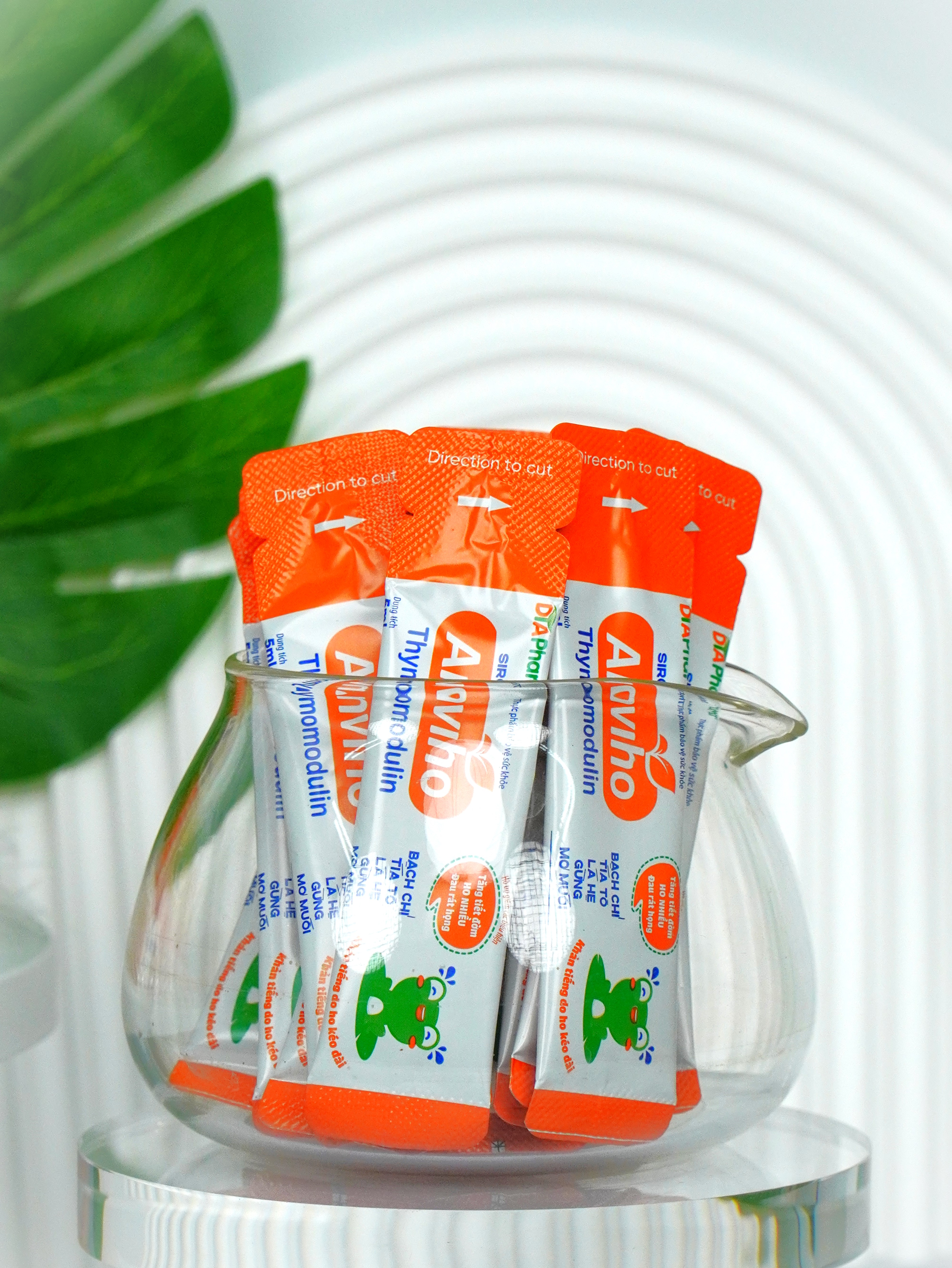 Siro uống Anviho cam Hỗ trợ làm ấm họng, giải cảm, giảm ho, long đờm, tăng cường sức đề kháng của trẻ. Hỗ trợ giảm đau rát họng do ho kéo dài, do viêm đường hô hấp trên Hộp 30 gói