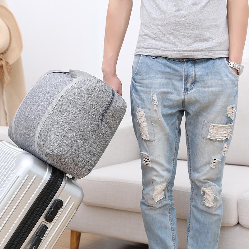 Túi du lịch xách tay siêu lớn chống thấm nước có thể gập lại cho nam và nữ Chuyến công tác ngắn Túi du lịch một vai Túi hành lý xe đẩy