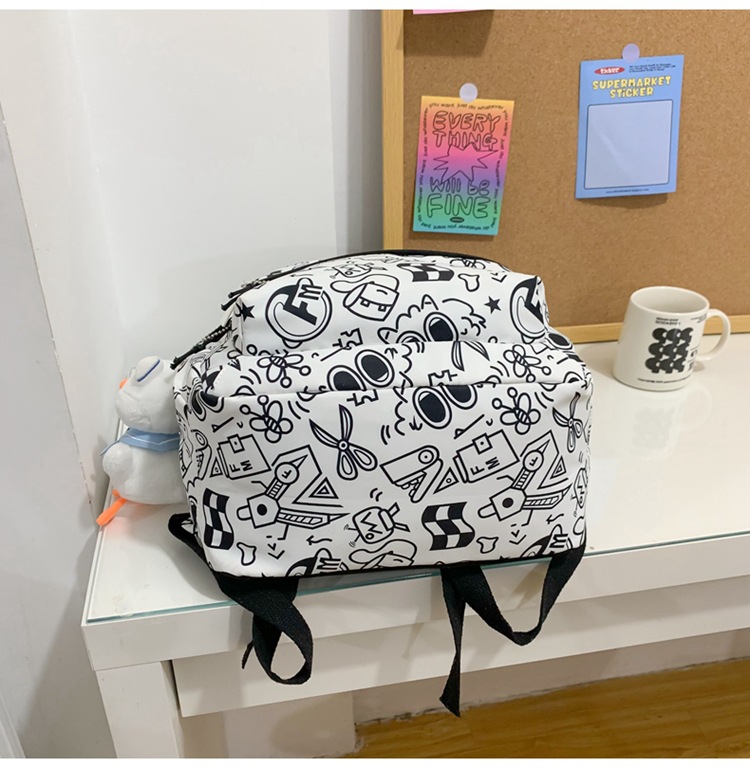 Balo vải học sinh, sinh viên thời trang in hình Doodle Dụng cụ học tập lạ mắt