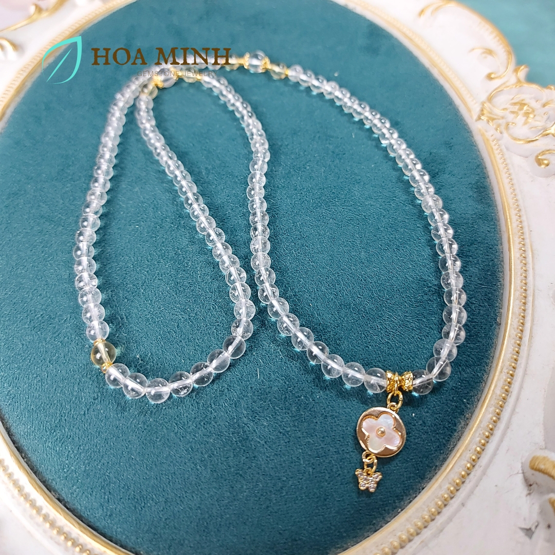 Vòng chuỗi 108 hạt Thạch Anh Trắng pha lê size hạt 6 li phối charm cỏ 4 lá và bướm nhỏ đính đá, ốp hoa, thạch anh vàng