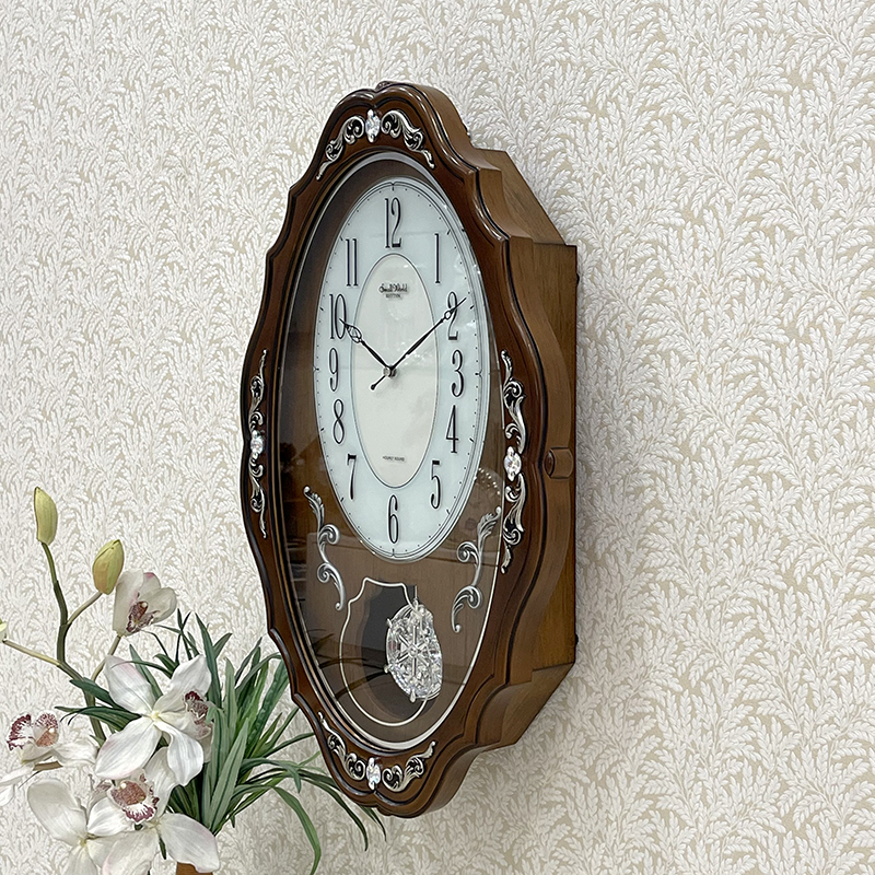 Đồng hồ treo tường Rhythm COMFORT SWING PENDULUM CMJ462CR06 Vỏ màu nâu