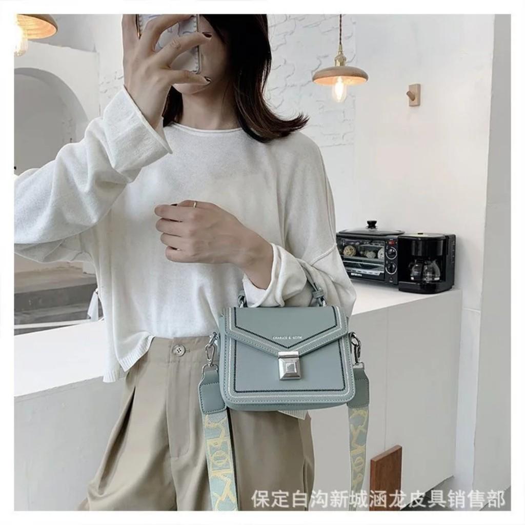 Túi đeo chéo nữ hàng Quảng châu trần chỉ khóa bấm