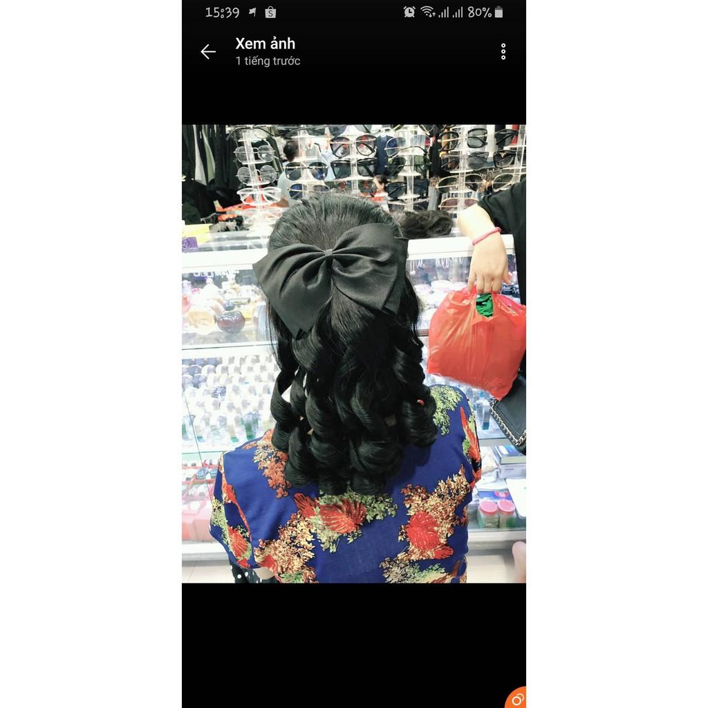 Búi kẹp nơ tóc giả