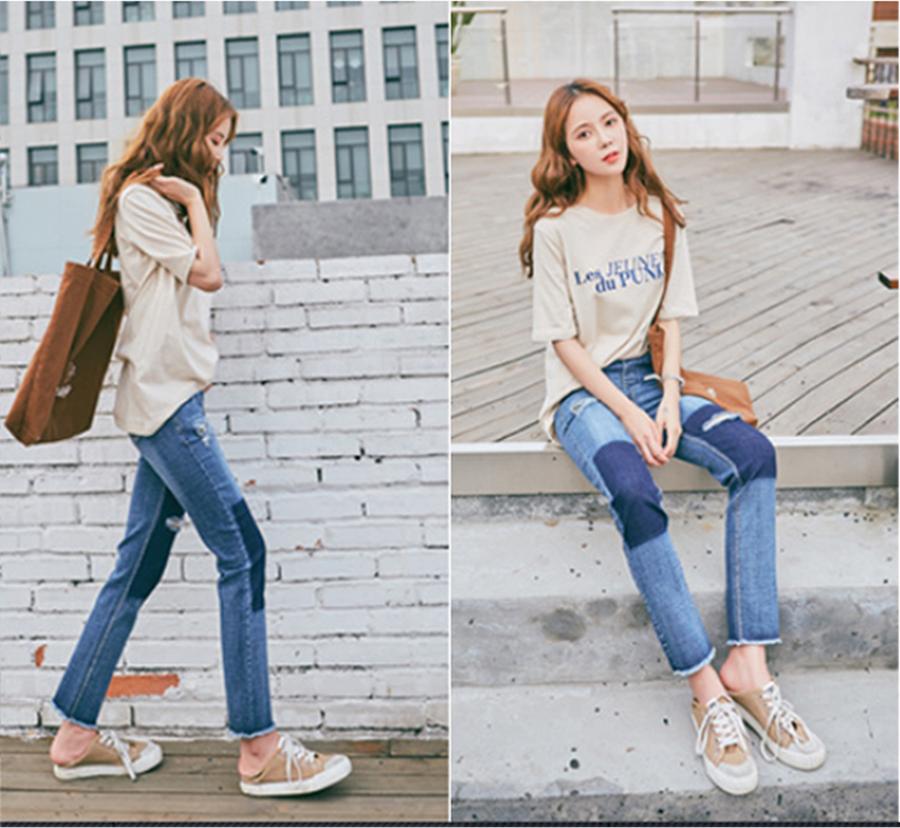 Quần Jeans nữ rách chân tua rua