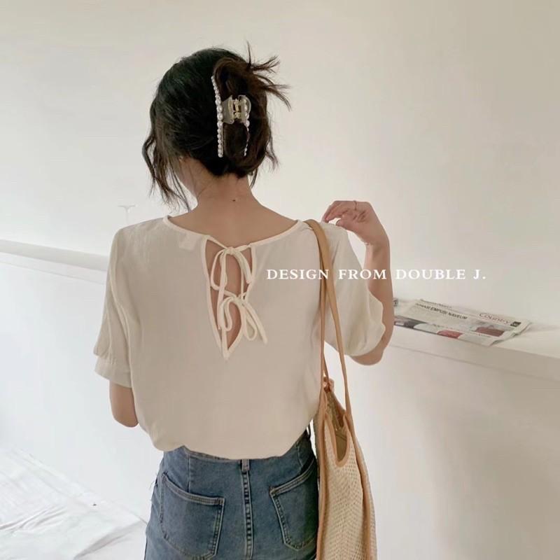Sơ mi thắt nơ sau lưng chất trượt nhẹ