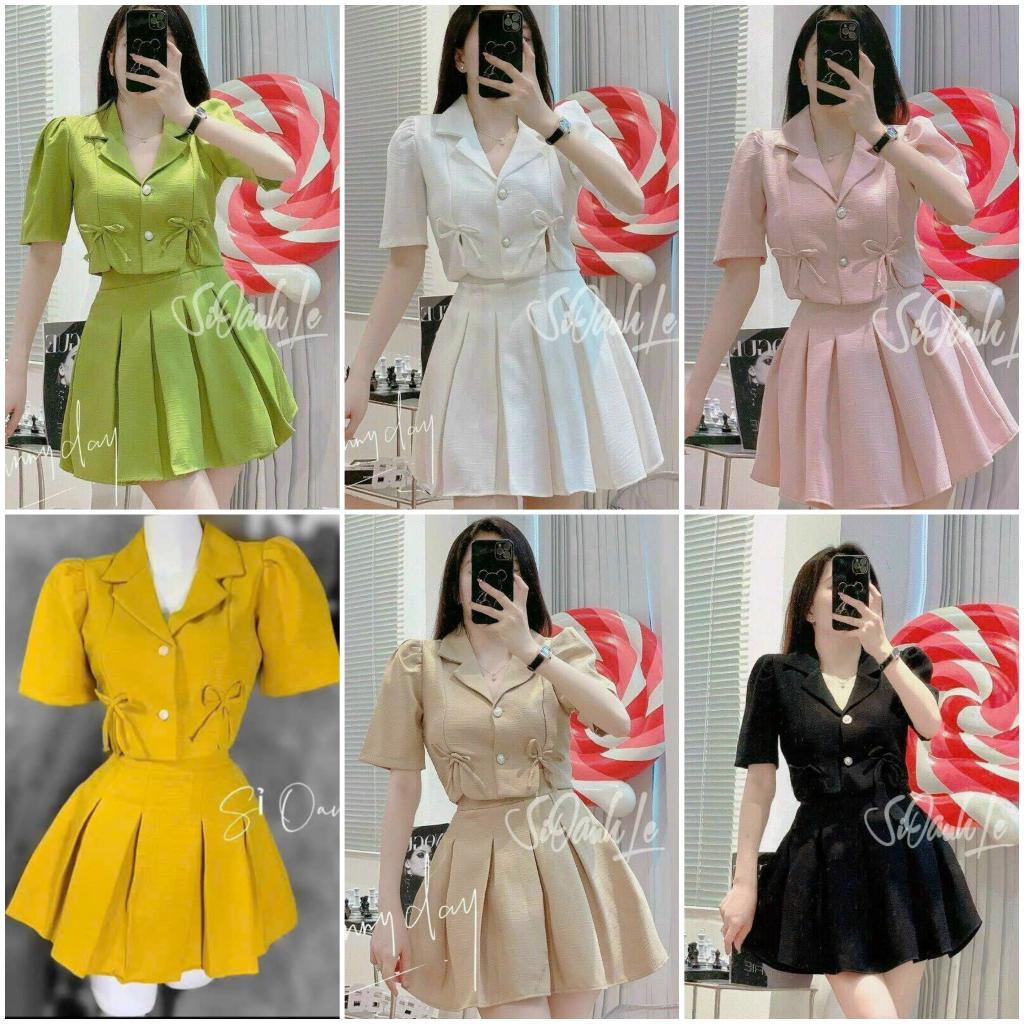 Sét áo vest phom lửng đính nơ và chân váy xoè xếp ly
