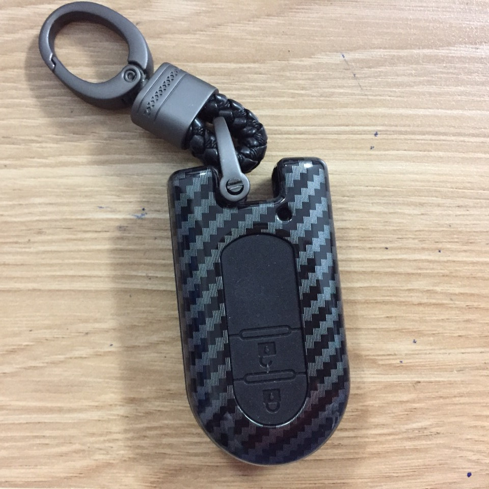 Ốp chìa khóa Carbon dành cho xe Toyota Rush có kèm móc khóa