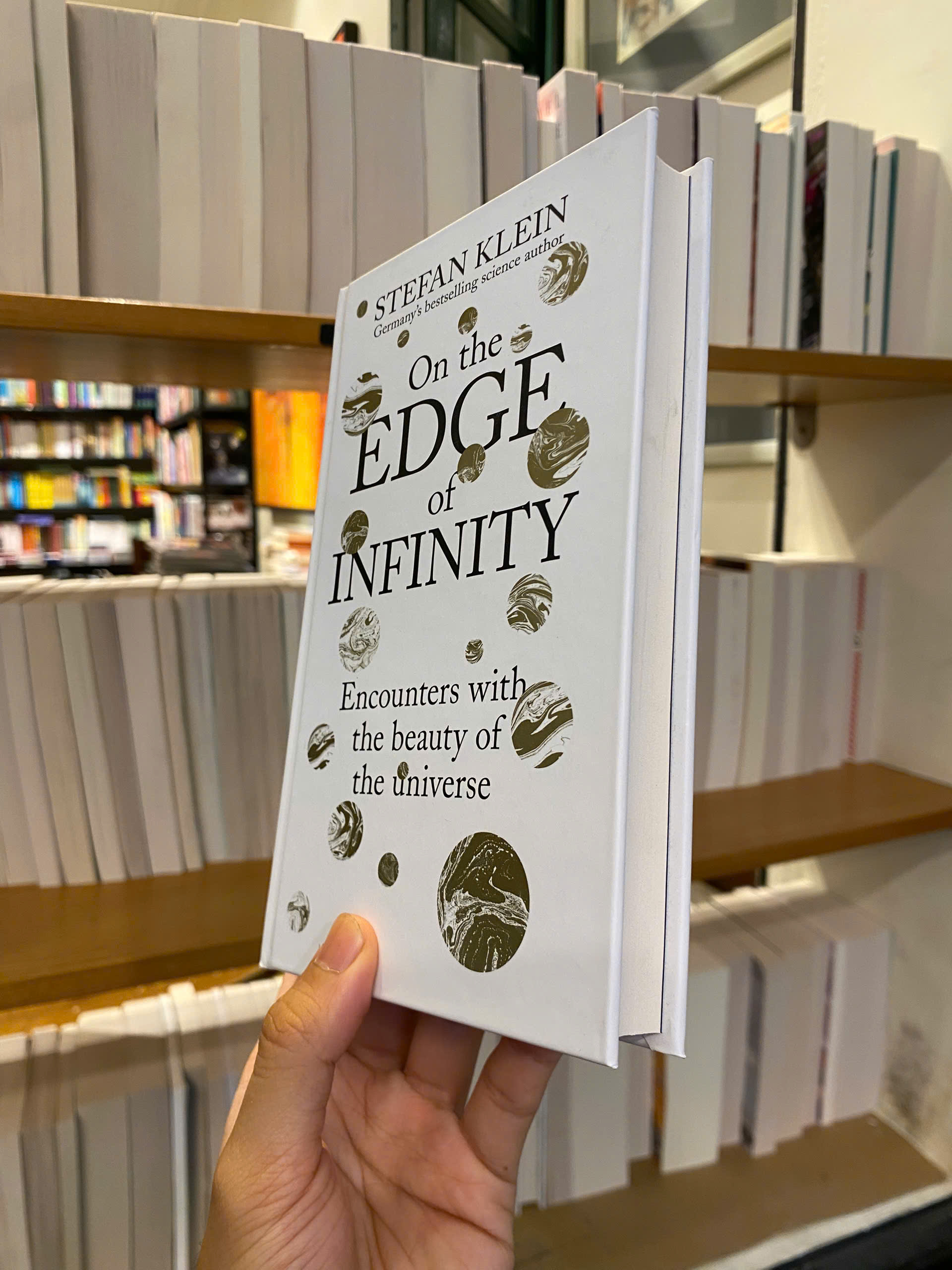Sách - On the Edge of Infinity by Stefan Klein - Science/Nonfiction book in English - Bìa Cứng
