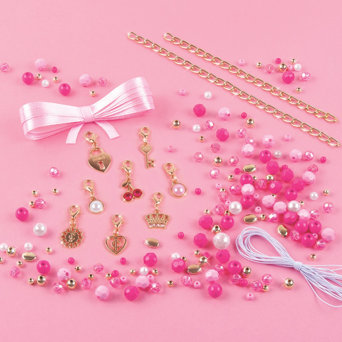 Đồ Chơi Bộ Làm Vòng Tay Juicy Couture Hồng Điệu Đà MAKE IT REAL 4413MIR