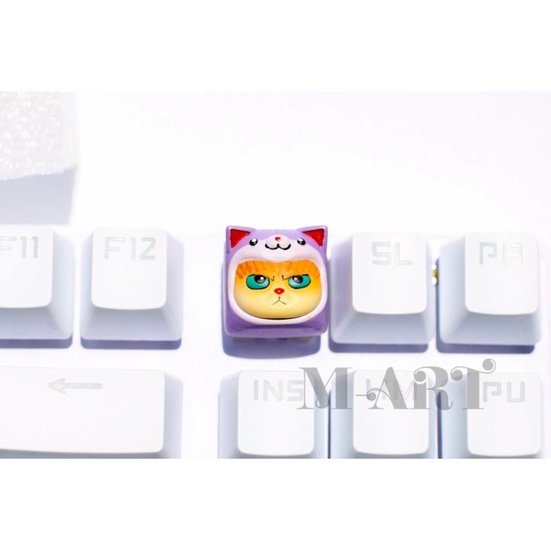 Keycaps mèo dễ thương và chiếc mũ màu tím