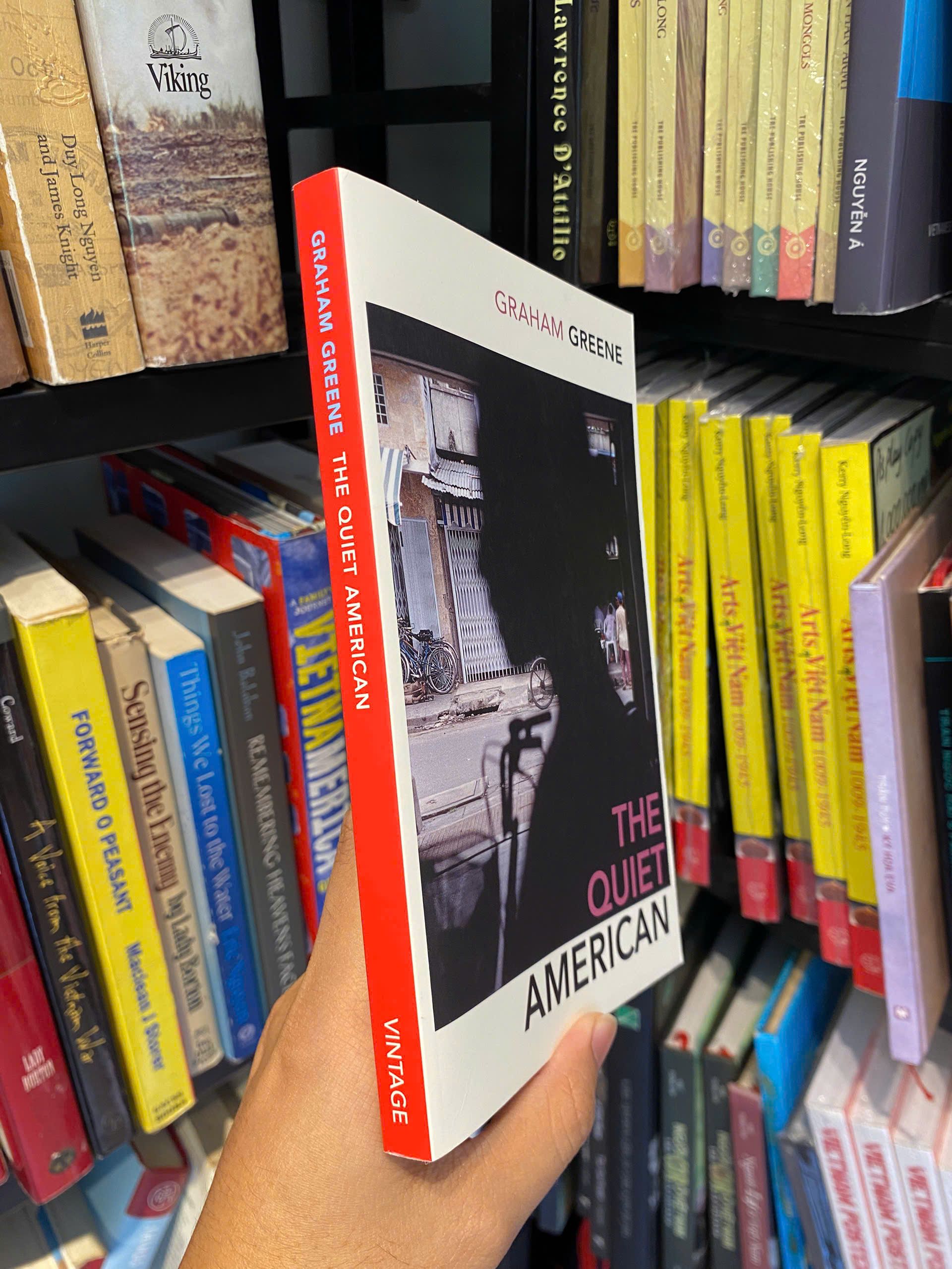 Sách - The Quiet American: Exploration of love, innocence, and morality in Vietnam by Graham Greene | Classics / Historical Fiction / War Literature