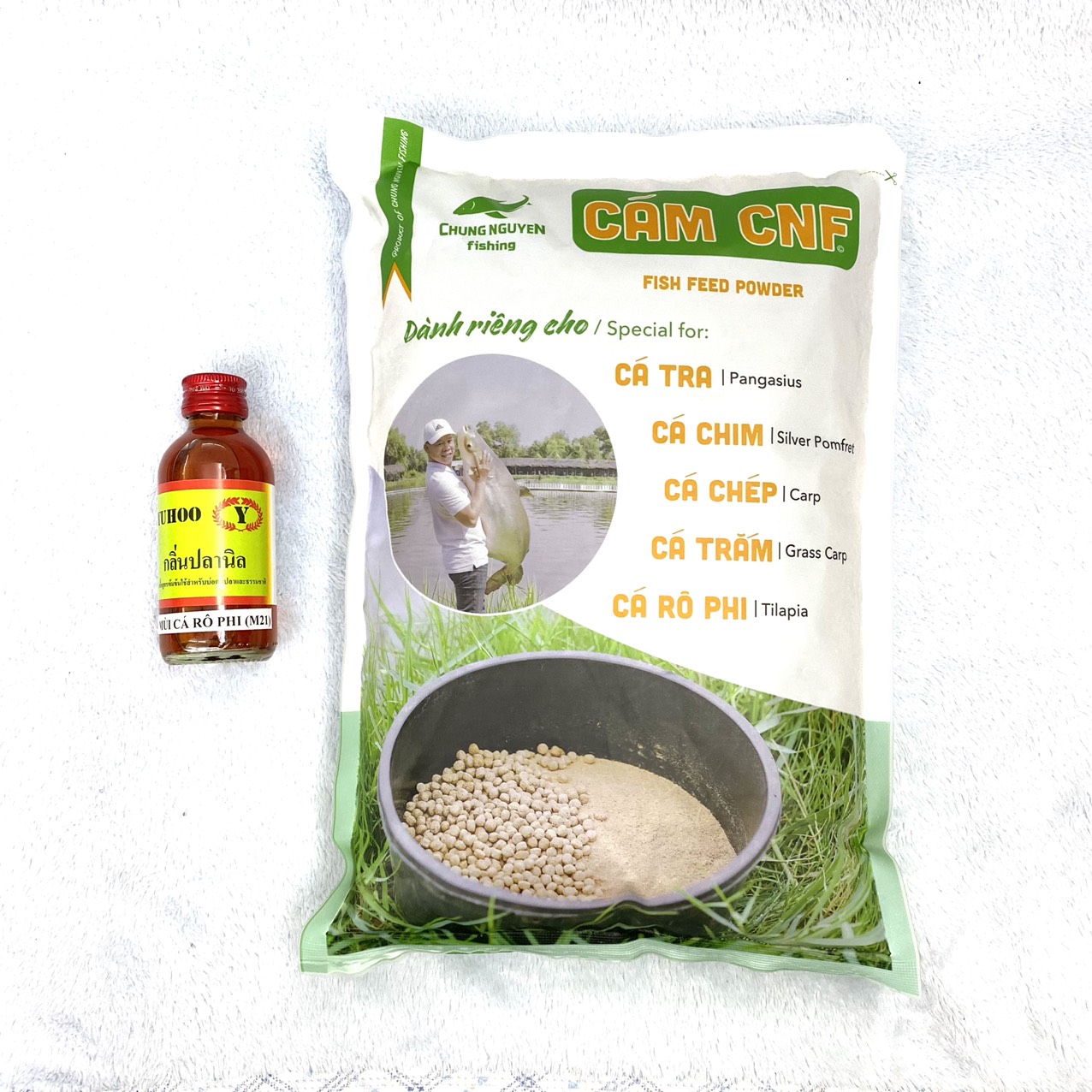 Mồi Câu Cá Rô Phi , Combo 1kg Cám CNF + 1 Chai Tinh Mùi Thái Lan M21 Chuyên Câu Cá Rô Phi