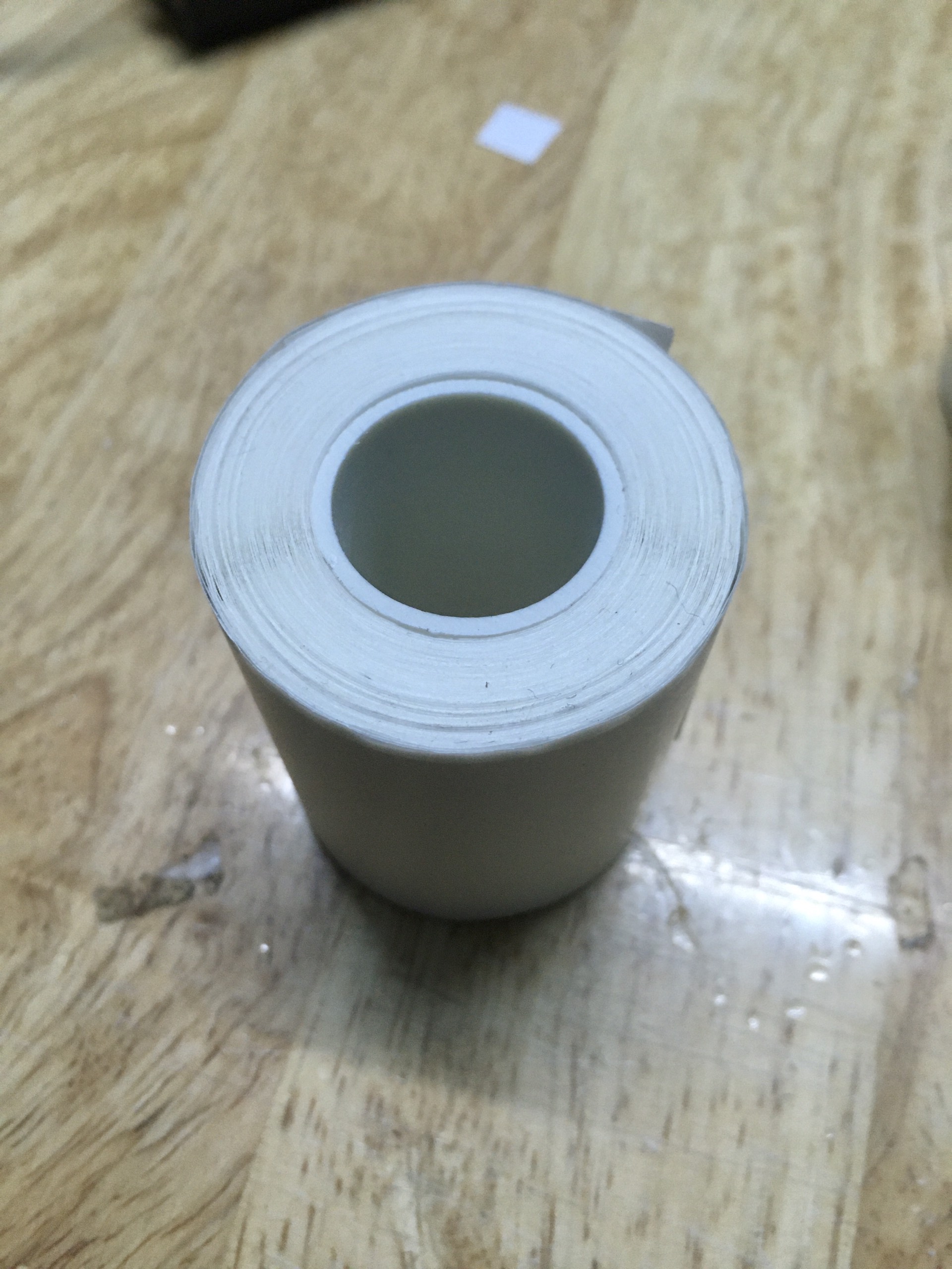 Giấy in nhiệt tem tròn dán dành riêng cho máy DP23 khổ 57 phi 45