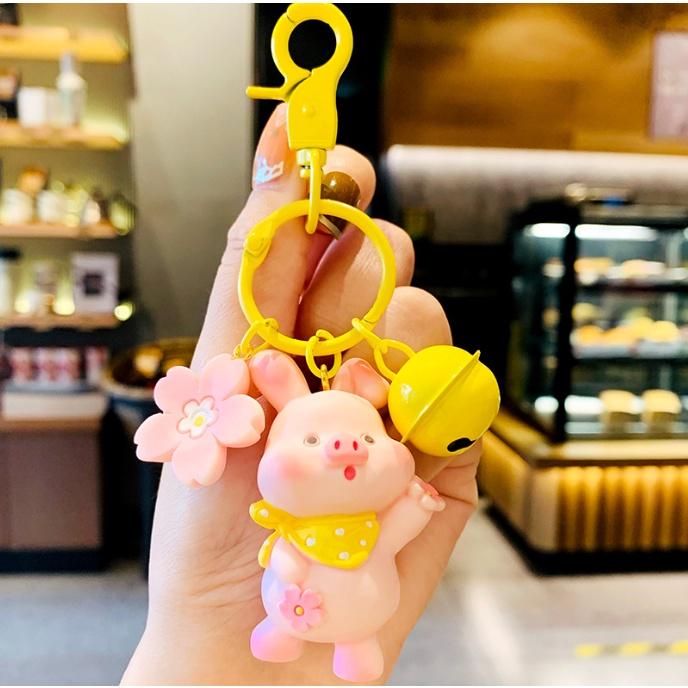Móc khóa heo con biêu cảm có chuông kêu dễ thương xỉu PVC loại tốt
