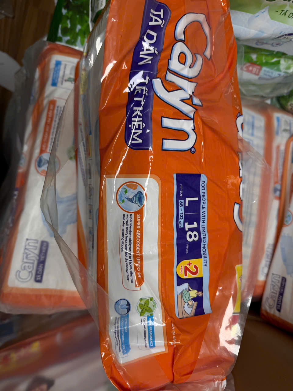 Combo 2 gói tã dán người già Caryn ngày và đêm siêu tiết kiệm gói lớn M18/L18 miếng