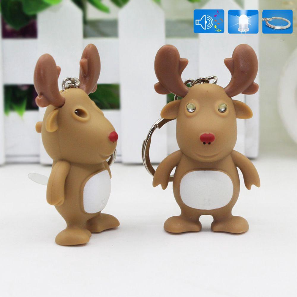 Móc khóa hình con tuần lộc giáng sinh phát sáng đèn Led có đèn có âm thanh