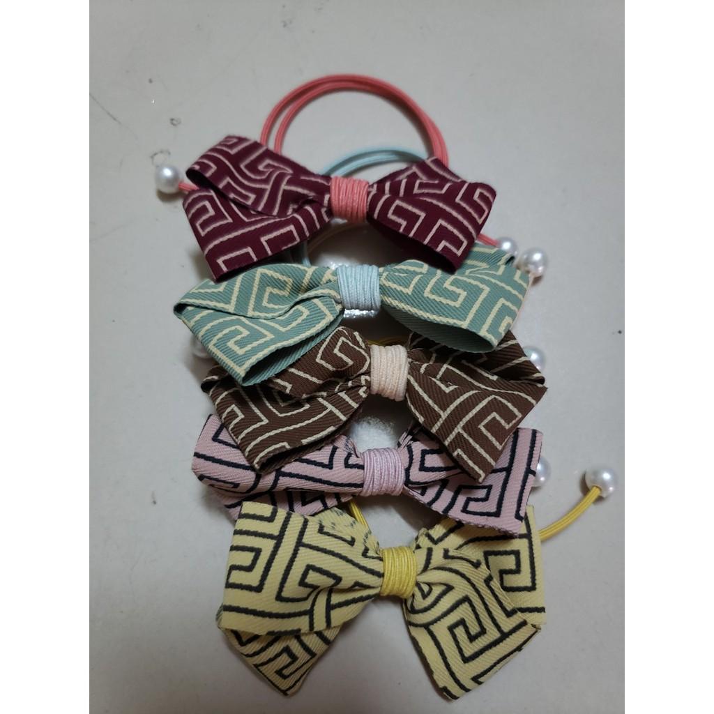 Dây cột tóc nơ dễ thương,nhiều màu cho các nàng chọ lựa