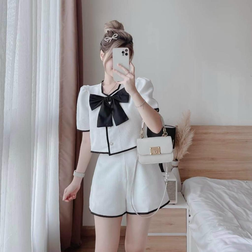 Sét áo viền lửng cài nút kèm nơ và quần sooc ngắn