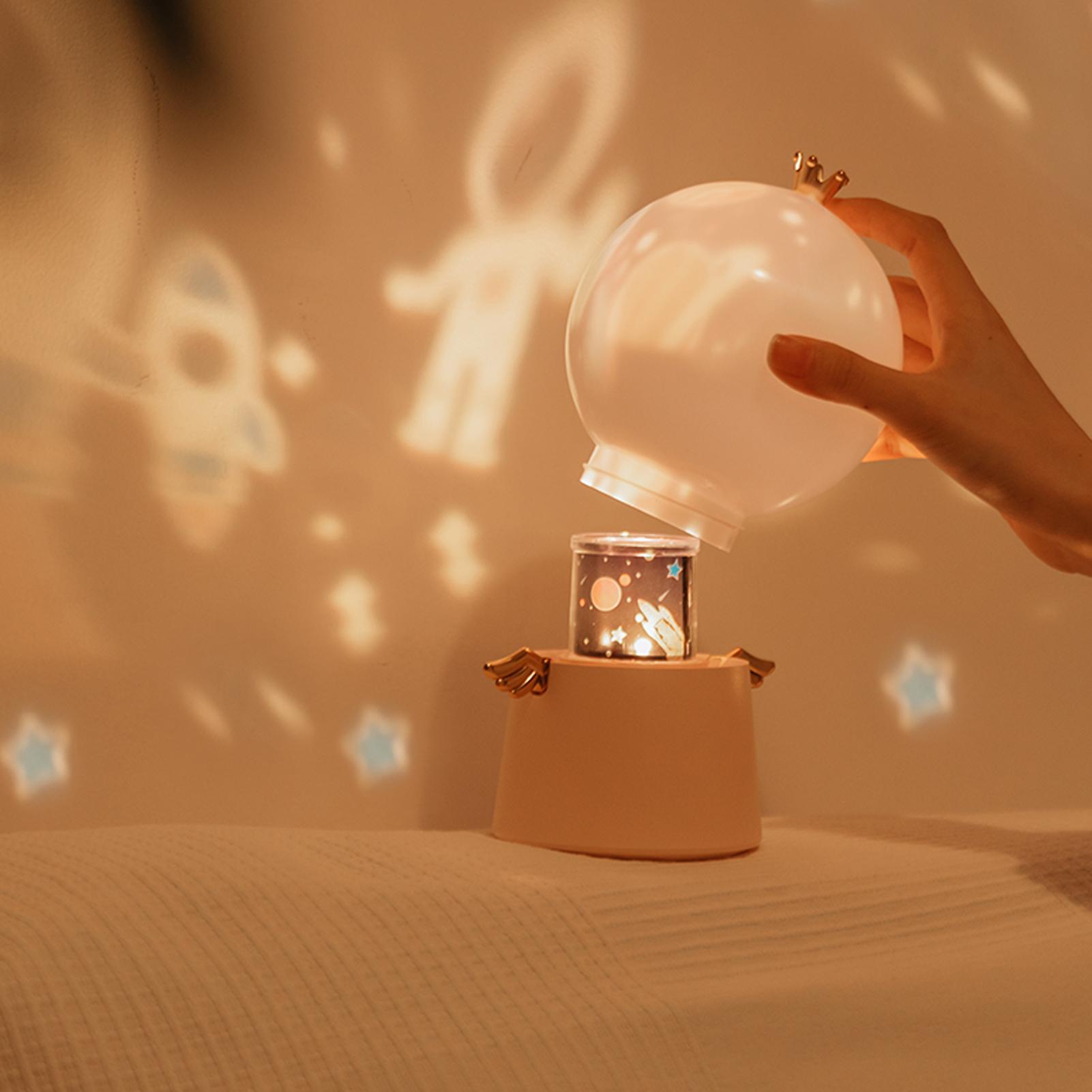 Hộp nhạc kết hợp máy chiếu ánh sáng đèn ngủ với 6 cuộn phim thay thế