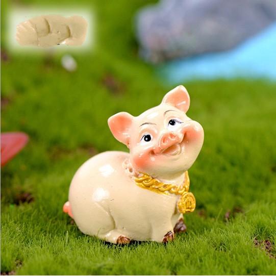 Mô hình lợn hồng béo múp sang chảnh với đầy vàng bạc bên người cầu năm mới thịnh vượng