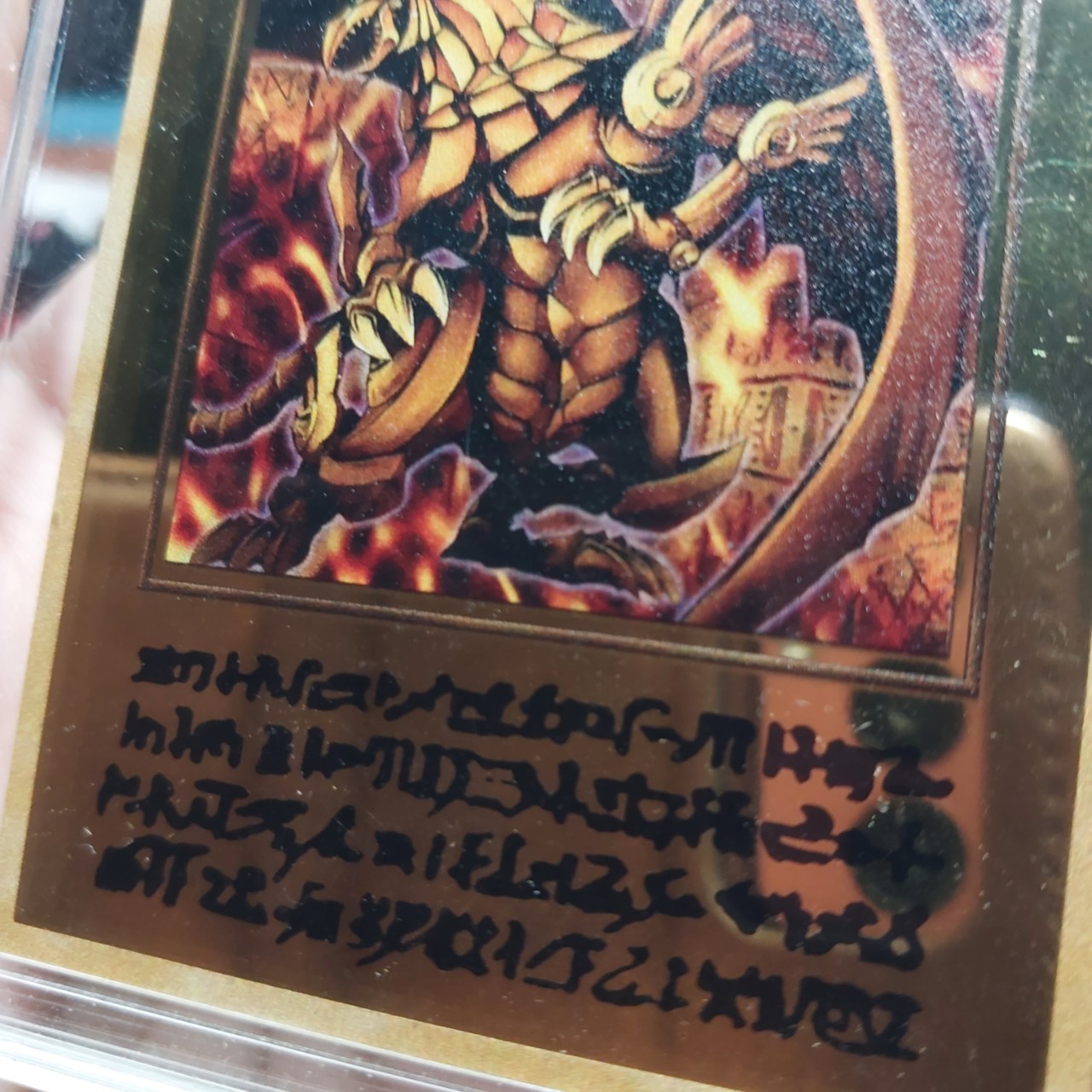 Thẻ yugioh kim loại kỹ niệm lá The Winged Dragon Of Ra Pgld-en031 vị thần Ras hợp kim ánh gương 1458 D10 2