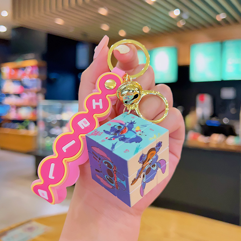 Móc Khóa Rubik Có Chuông Và Dây Đeo Silicon Nhiều Màu Sắc Dễ Thương