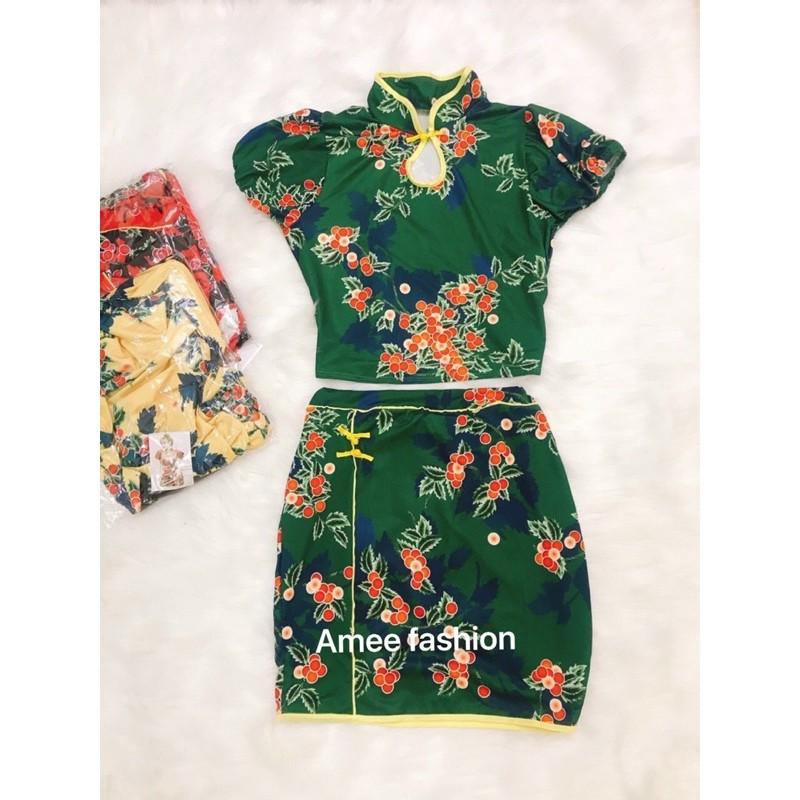 Sét áo cổ tàu khoét ngực phối chân váy mini in họa tiết