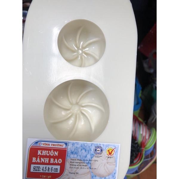 Khuôn bánh bao có cán cầm