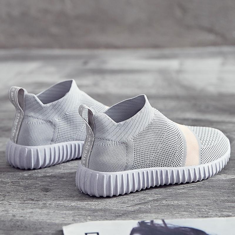 Giày thể thao nhẹ màu trắng thời trang cho nữ